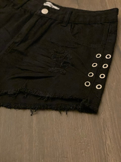 Shorts con occhielli