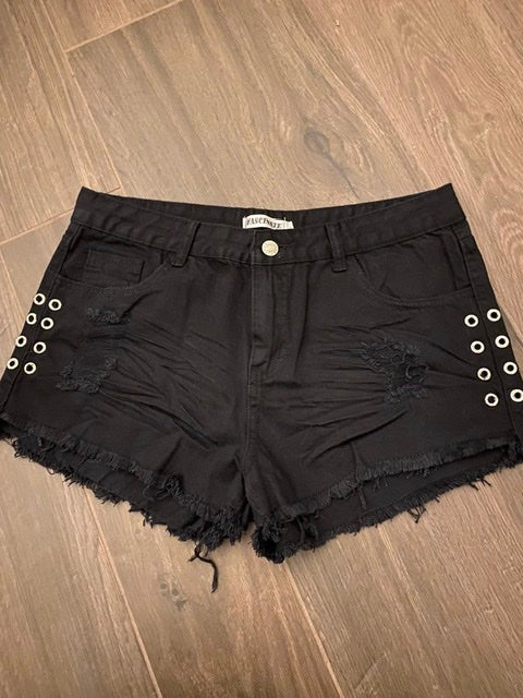 Shorts con occhielli